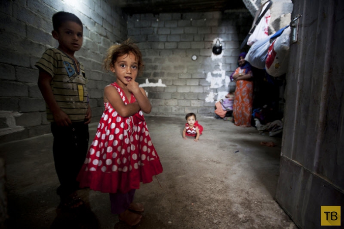 За гранью бедности: портреты детей (14 фото)